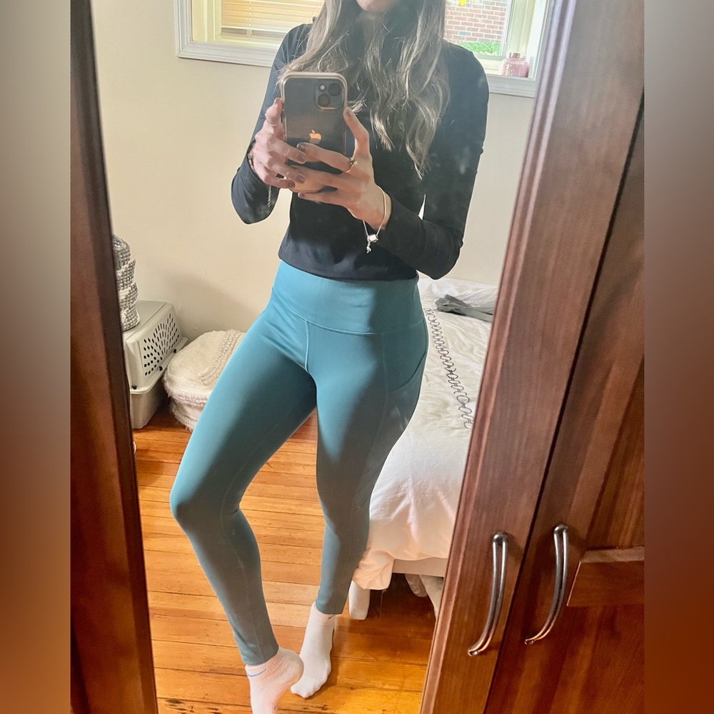 New Balance turquoise workout leggings with pockets